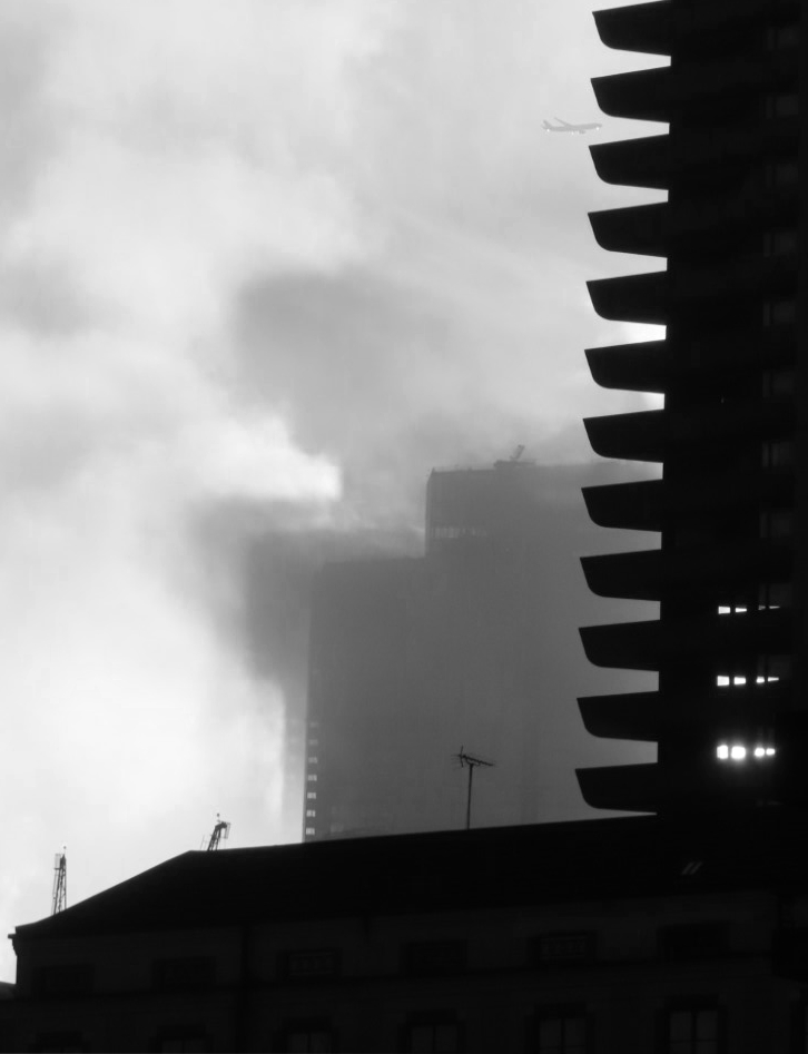 Shadow of a tower in the clouds